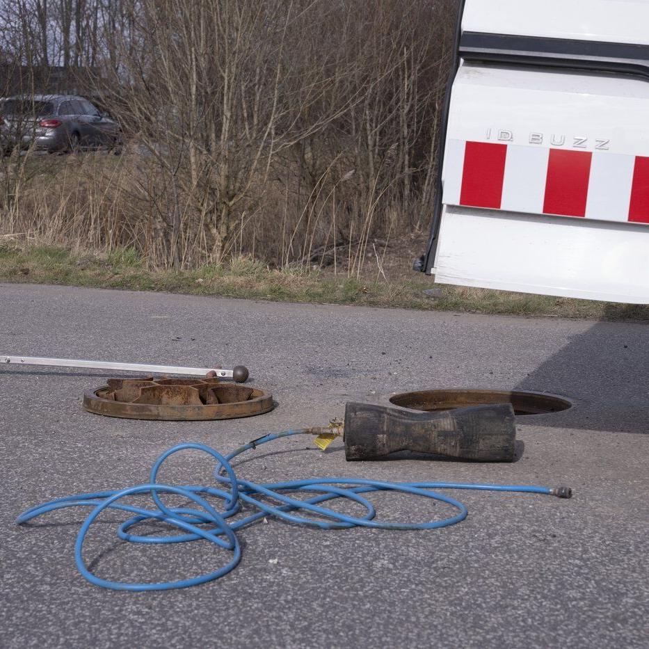 Danish people arrest 2 on suspicion of killing a man whose body was found in a sewer